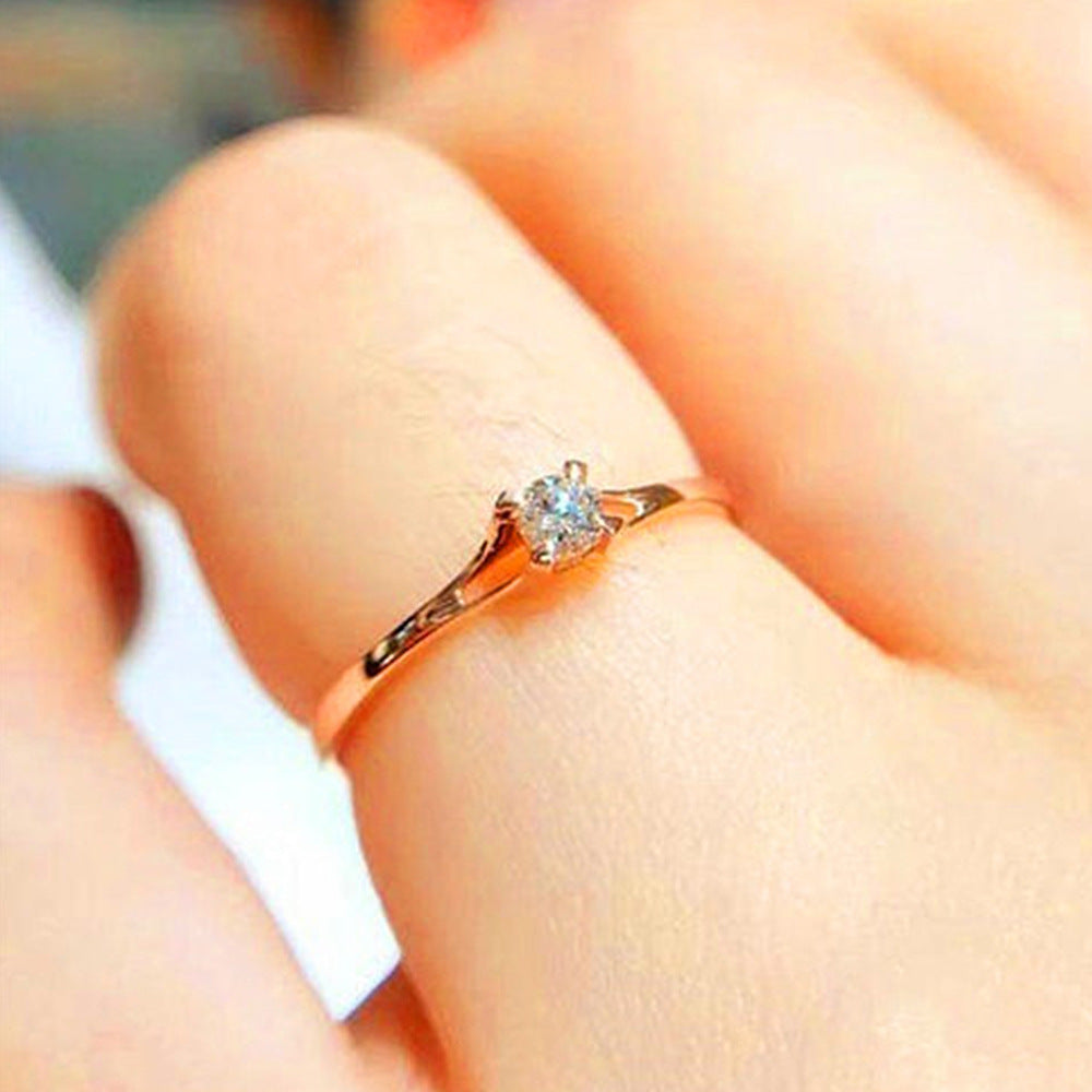 Classic Four-Prong Diamond Engagement Ring